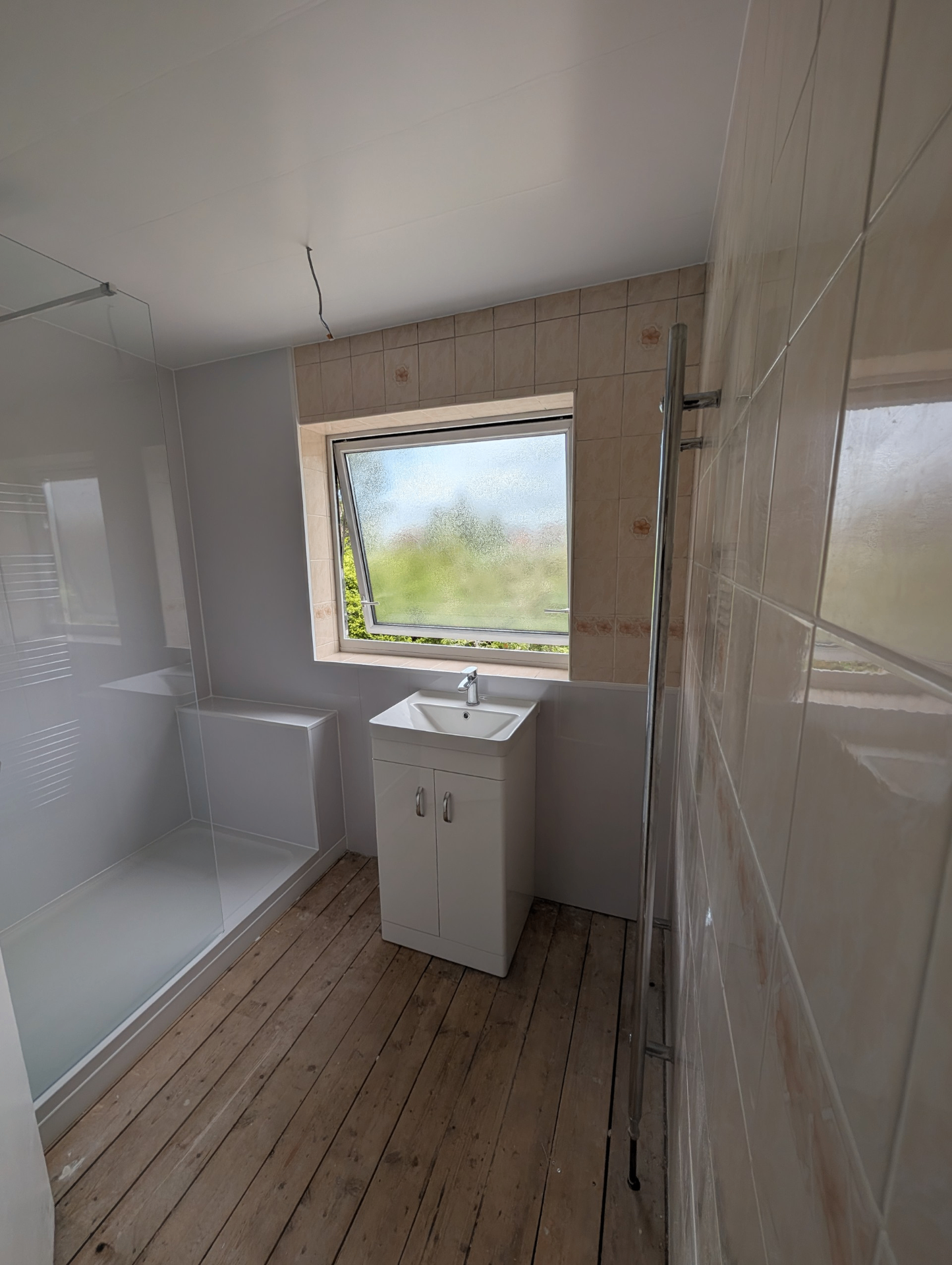 Wet room with walk-in shower and vanity unit — recent project